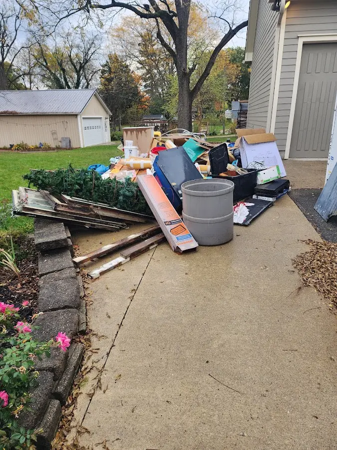 Dumpster being loaded with debris for 30 Yard Dumpster Rental in East Brandywine